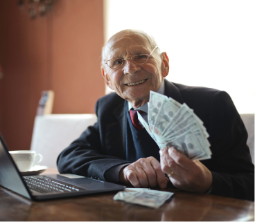 elderly man with money